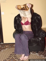 Teen brunette takes off pants and poses nude