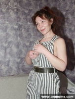 Mature brunette changes clothes