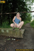 Outdoor pissing on the road