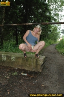 Outdoor pissing on the road