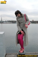 MILF outdoor pissing on pier