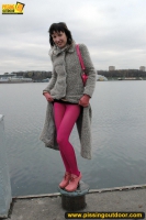 MILF outdoor pissing on pier