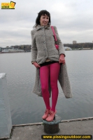 MILF outdoor pissing on pier
