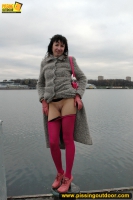MILF outdoor pissing on pier