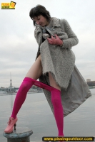MILF outdoor pissing on pier