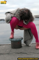 MILF outdoor pissing on pier