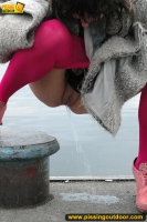 MILF outdoor pissing on pier