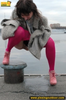 MILF outdoor pissing on pier