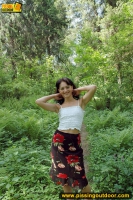 Teen brunette pissing outdoor in the forest