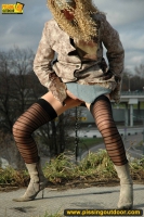Teen blonde pissing outdoor near the highway