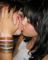 Girls kissing - N. C.