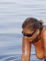 Milf big tits on the beach