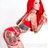 Latex lesbian oiled