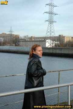 Pissing on the bridge over river - N