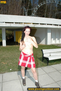 Teen brunette pissing in the park - N