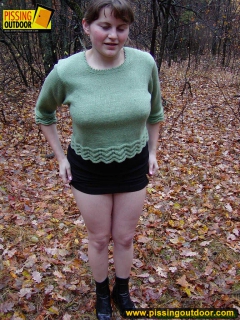 Pissing outdoor on dried leaves on a ground - N