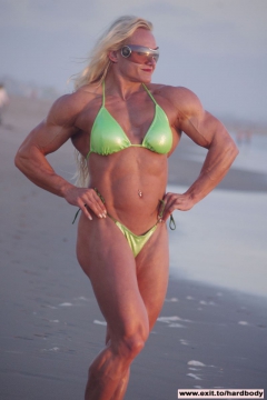 Amazing Muscle Babe posing outdoors - N
