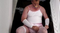 Diapered sissy in choker and chastity - N