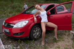 Girl posing near car - N