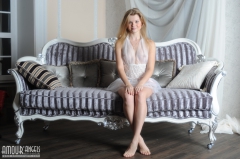 Innocent teen on sofa - N