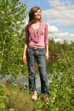 Girl pulling off her jeans - N