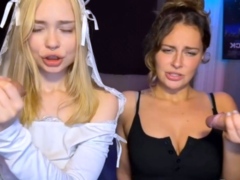 Two Slutty Babes Sucking Cock Side By Side