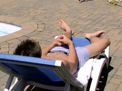 Horny young twink Jake is out in the sun topping up his tan