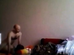 Bald man having fun with a girl