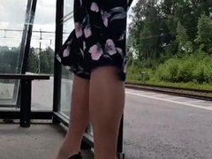 HannaTransa Chastity Crossdresser outdoors at train station.