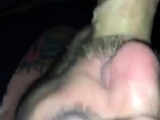 Sucking cum out of a tourist daddy in darkroom