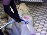 Mistress in latex punish her slaves