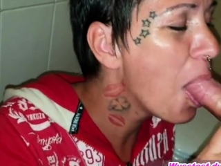 Tattooed milf fucks wild sexy cat in the toilet