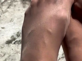 MILF in fishnet enjoys foot fetish